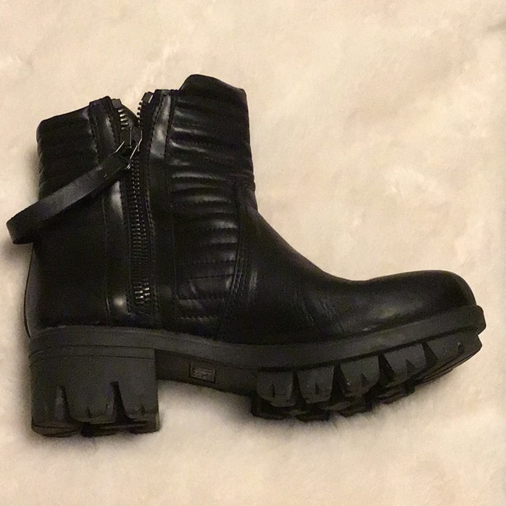 Arnold Churgin leather lug sole boots.